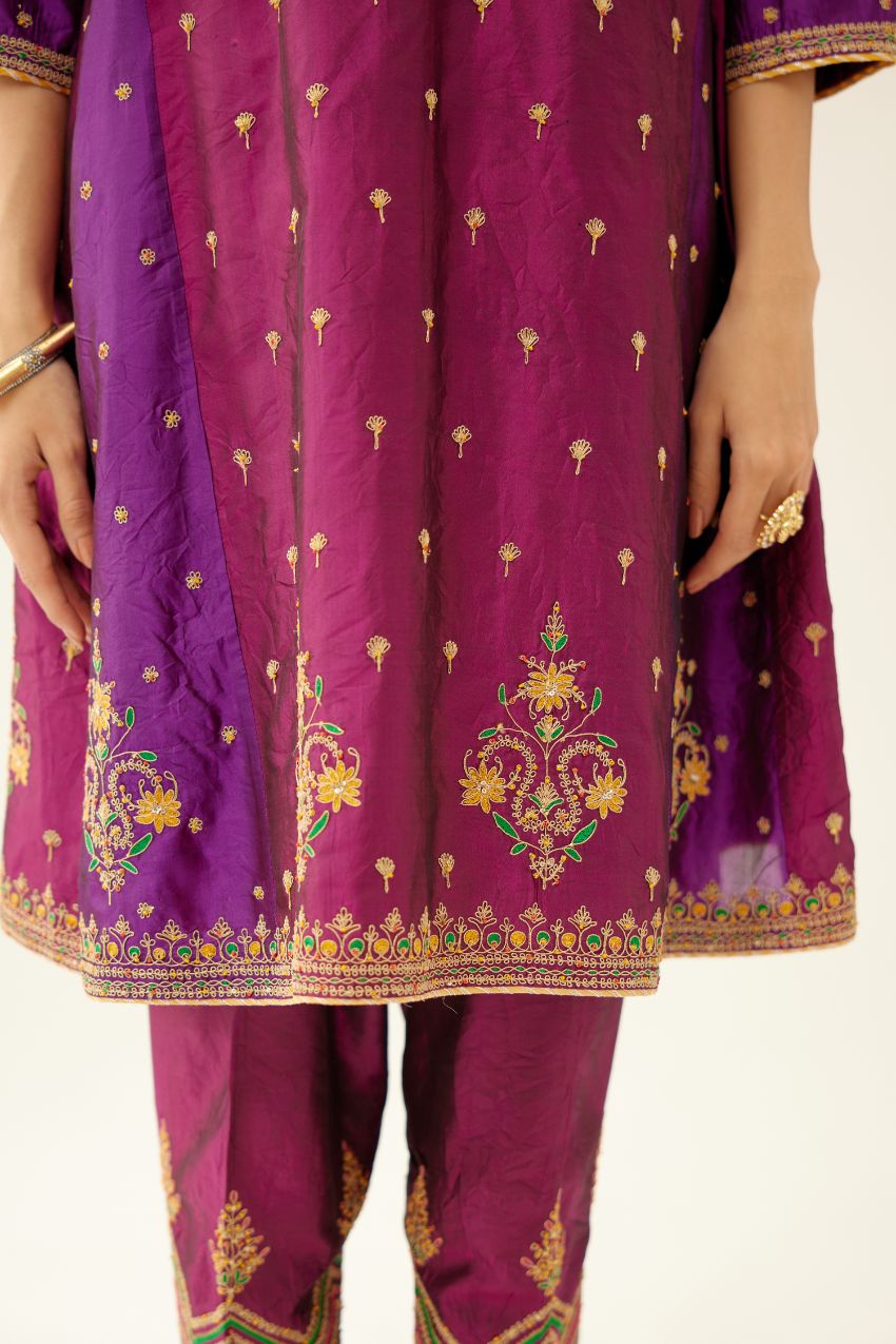 Sangria & plum purple silk short kalidar kurta set with all over dori & silk thread embroidery, highlighted with contrast bead & sequins work.