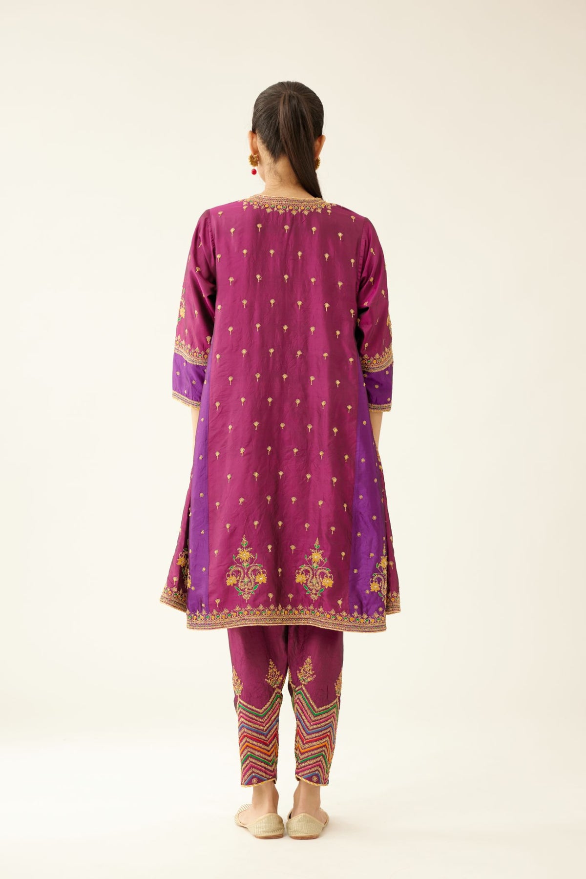 Sangria & plum purple silk short kalidar kurta set with all over dori & silk thread embroidery, highlighted with contrast bead & sequins work.