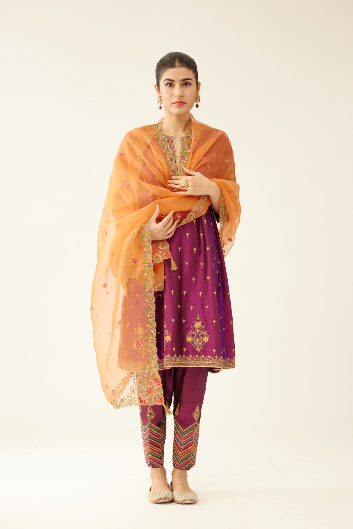 Sangria & plum purple silk short kalidar kurta set with all over dori & silk thread embroidery, highlighted with contrast bead & sequins work.