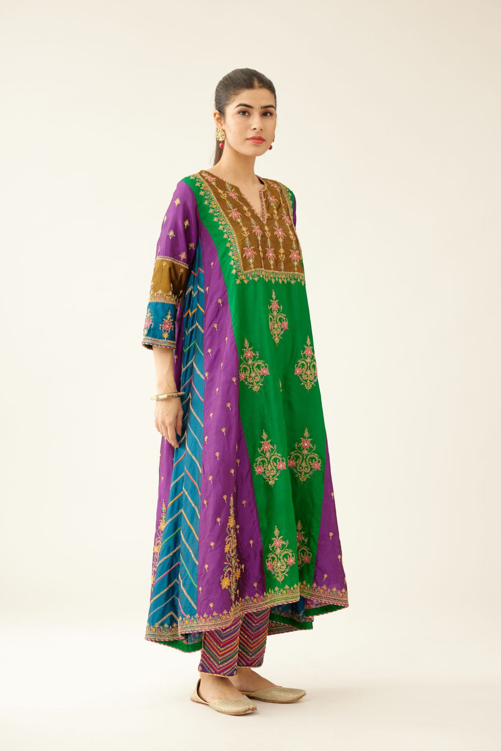 Color blocked multi panelled silk kurta dress set with asymmetric hem, highlighted with all over delicate dori & silk thread embroidery.