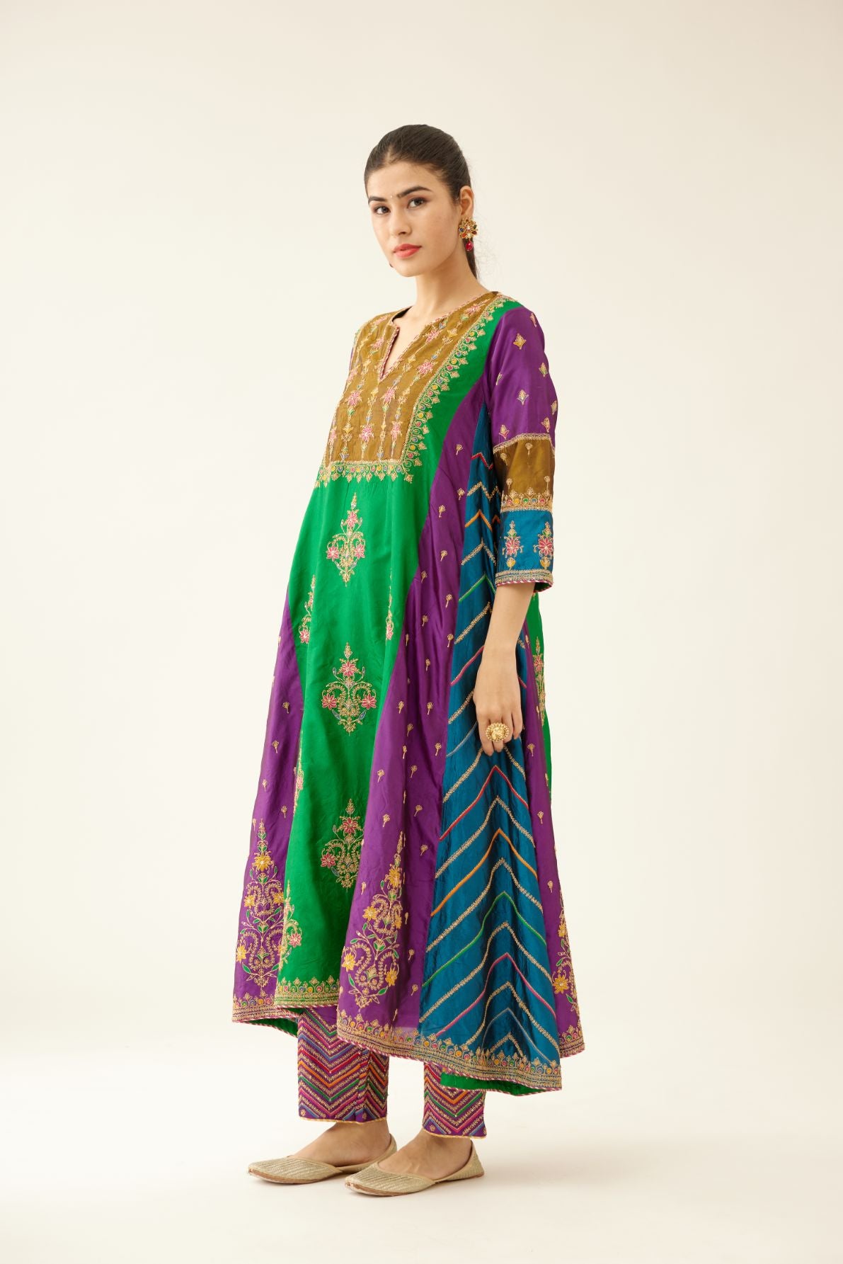 Color blocked multi panelled silk kurta dress set with asymmetric hem, highlighted with all over delicate dori & silk thread embroidery.