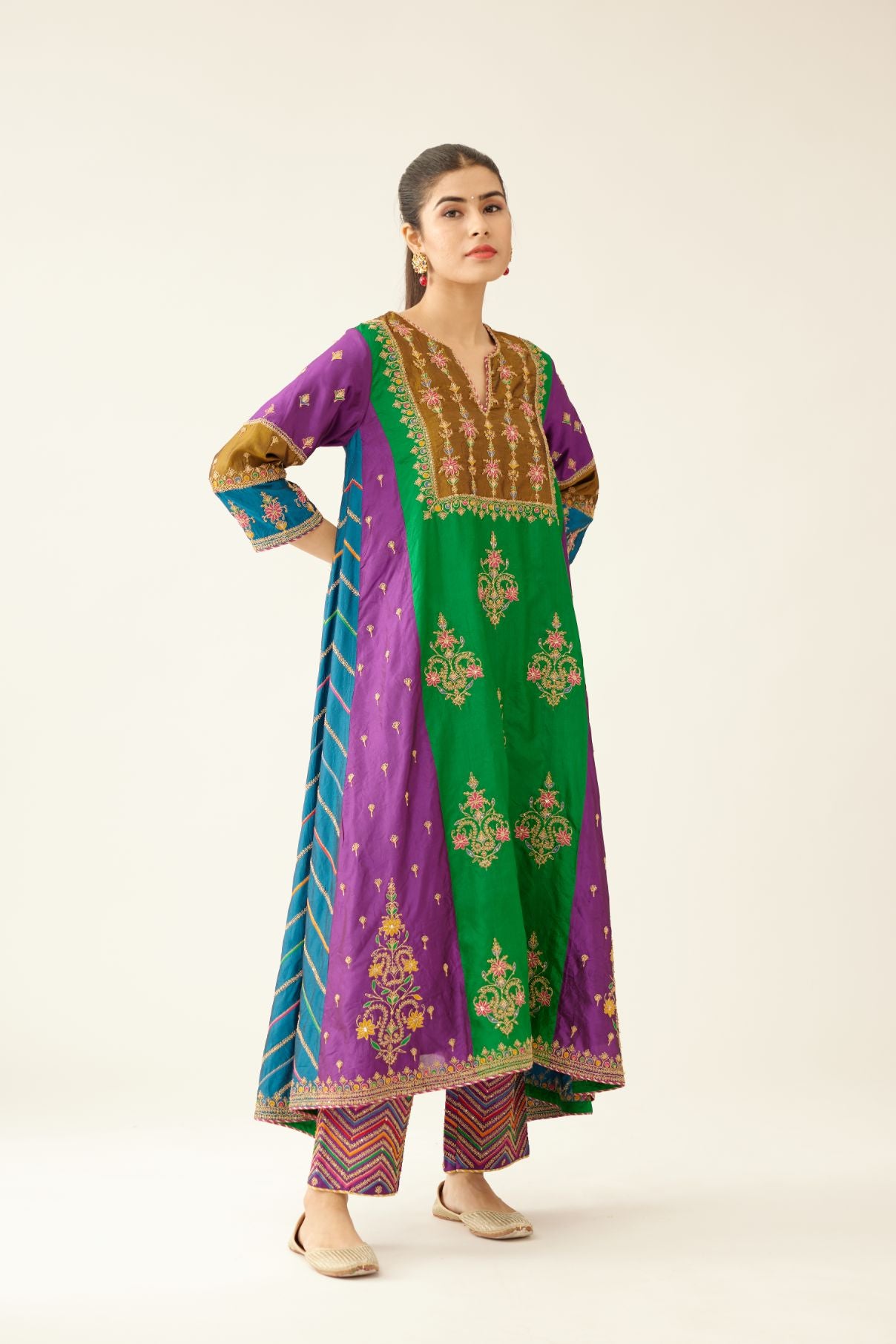 Color blocked multi panelled silk kurta dress set with asymmetric hem, highlighted with all over delicate dori & silk thread embroidery.