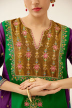 Color blocked multi panelled silk kurta dress set with asymmetric hem, highlighted with all over delicate dori & silk thread embroidery.