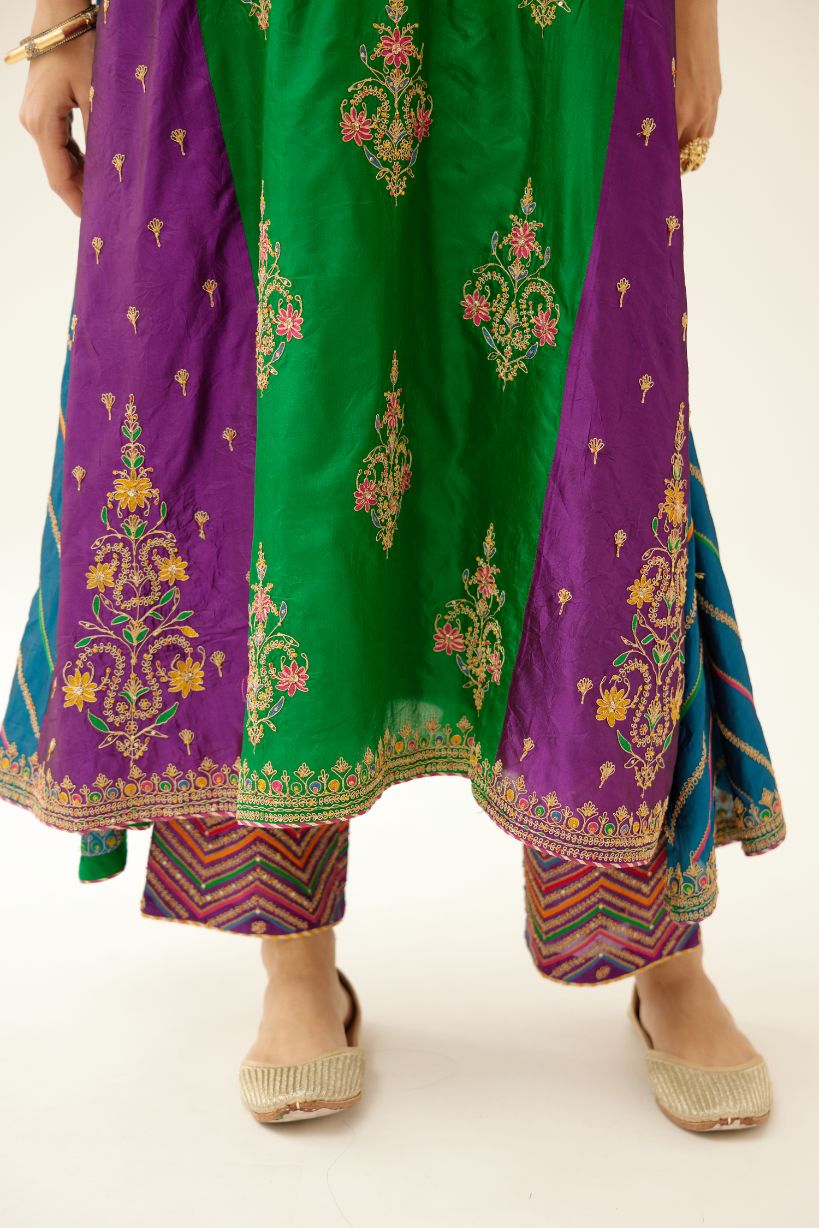 Color blocked multi panelled silk kurta dress set with asymmetric hem, highlighted with all over delicate dori & silk thread embroidery.