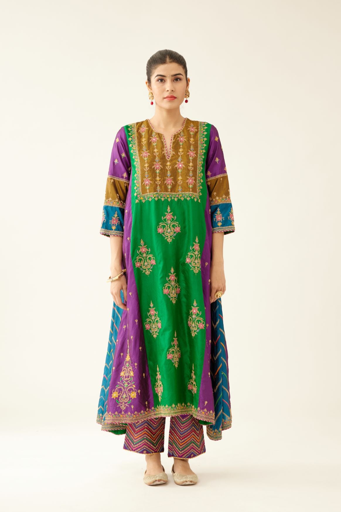 Color blocked multi panelled silk kurta dress set with asymmetric hem, highlighted with all over delicate dori & silk thread embroidery.