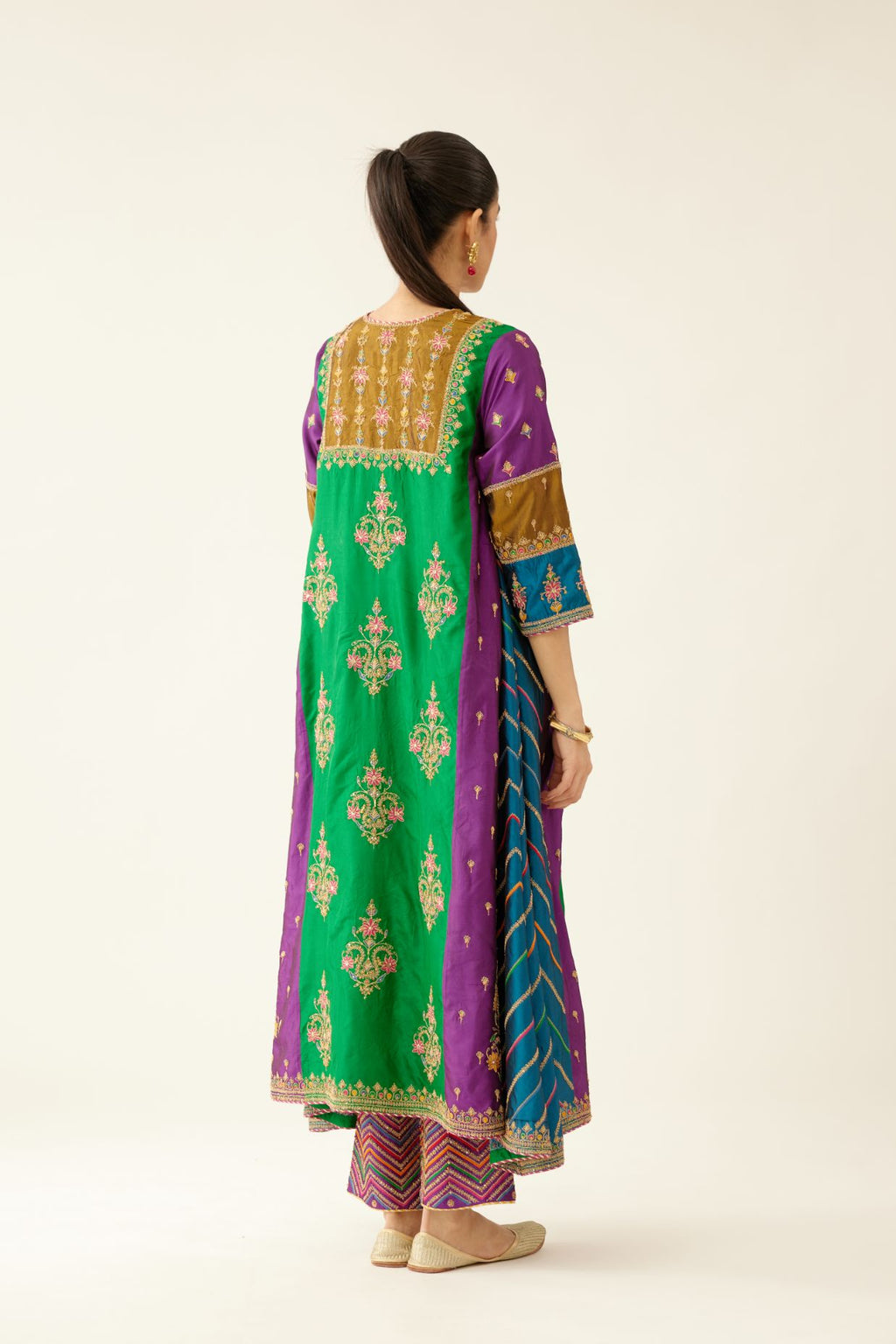 Color blocked multi panelled silk kurta dress set with asymmetric hem, highlighted with all over delicate dori & silk thread embroidery.