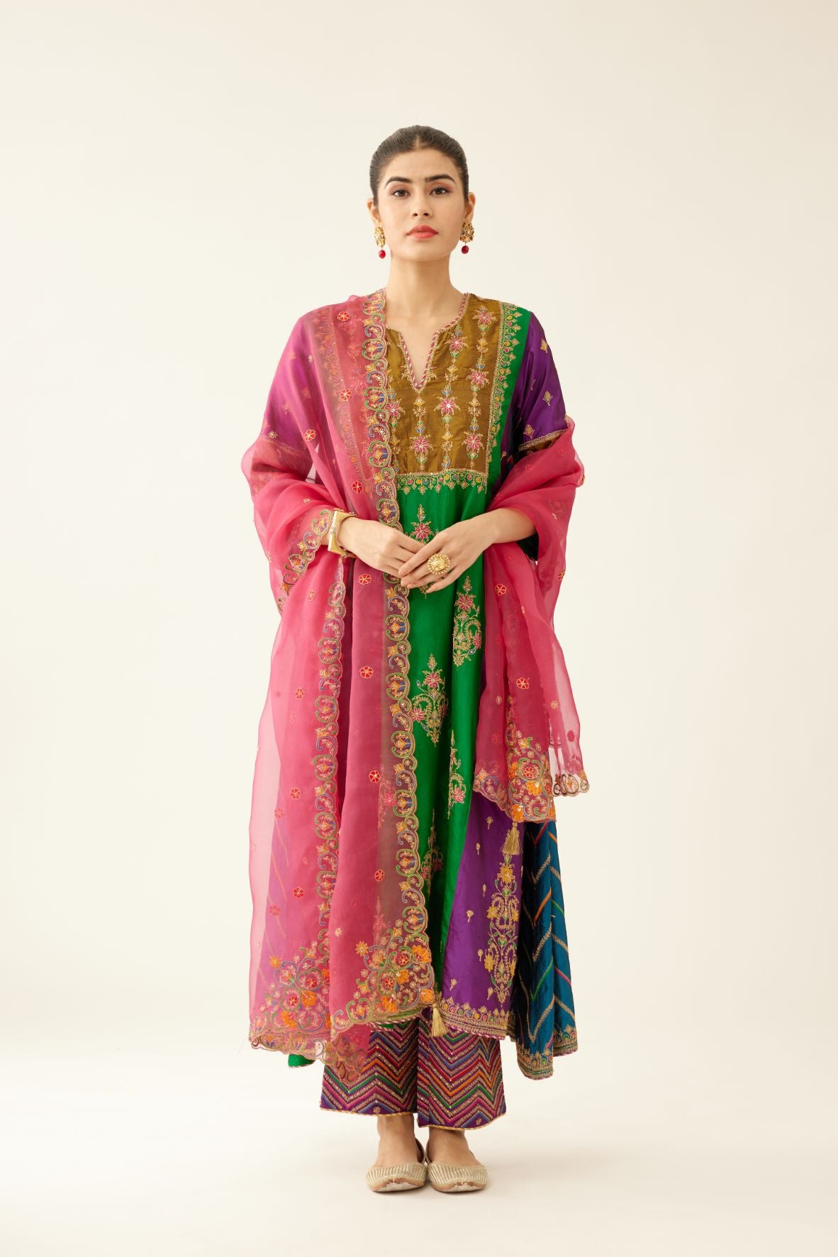 Color blocked multi panelled silk kurta dress set with asymmetric hem, highlighted with all over delicate dori & silk thread embroidery.