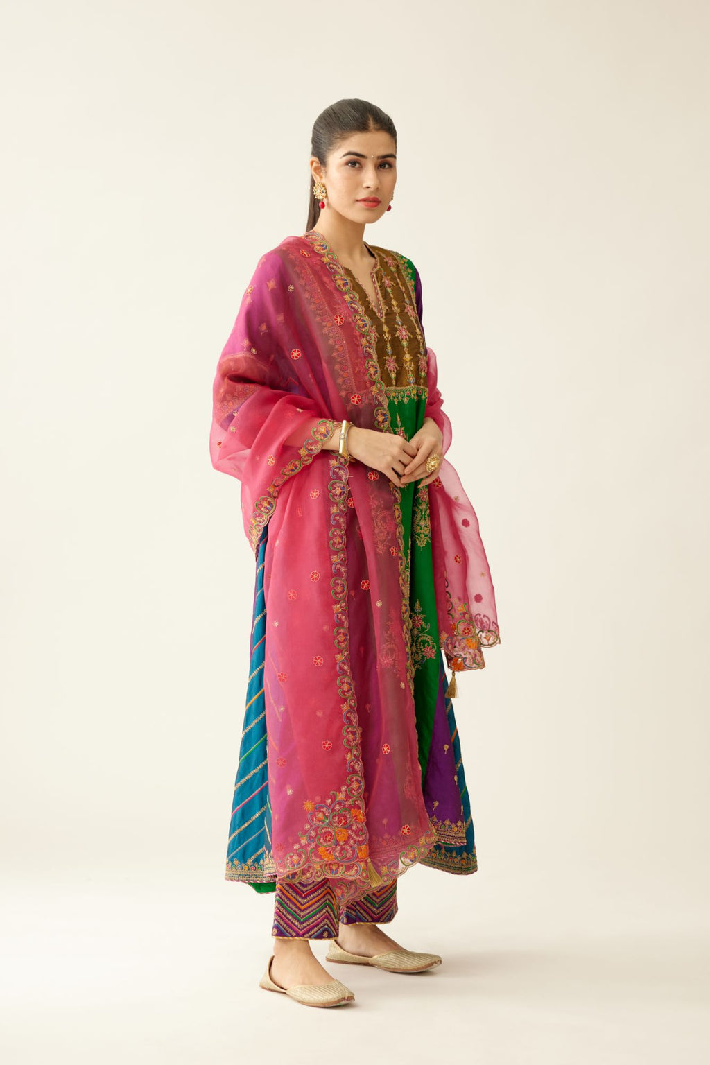 Color blocked multi panelled silk kurta dress set with asymmetric hem, highlighted with all over delicate dori & silk thread embroidery.