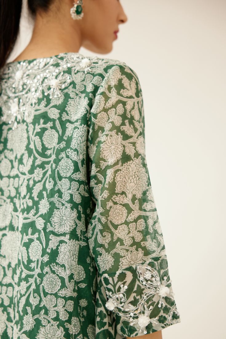 Green hand block printed easy fit, asymmetric hem, paneled kurta set with sequins, tassels and bead work.