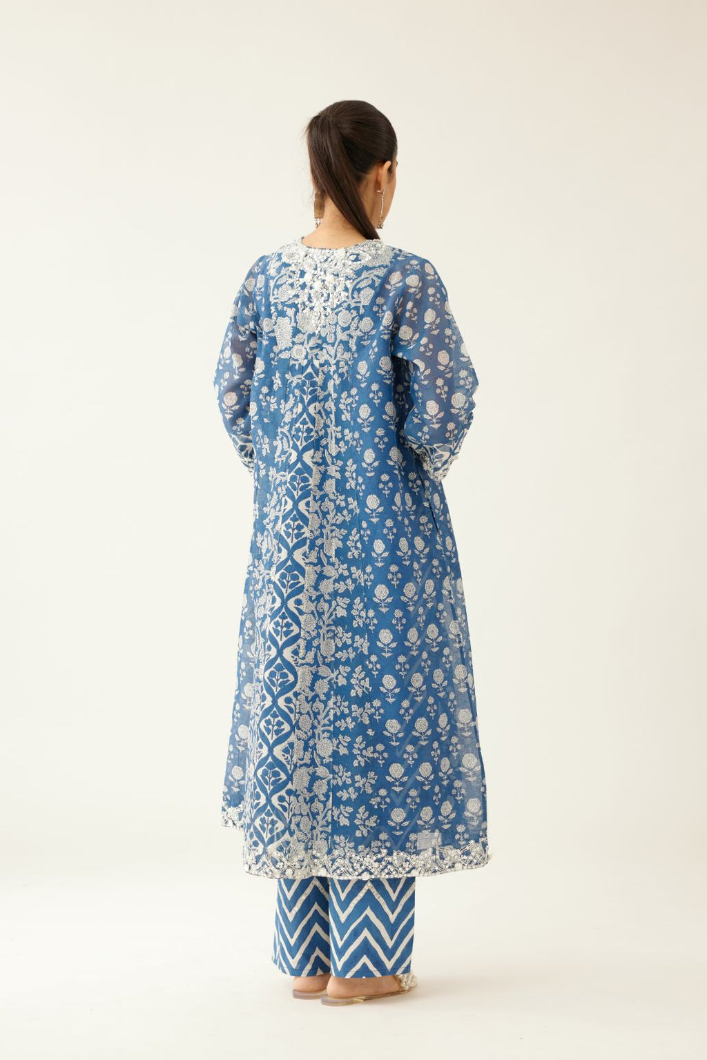 Blue hand block printed kurta dress set with a V neck, detailed with sequin, tassels and bead work.