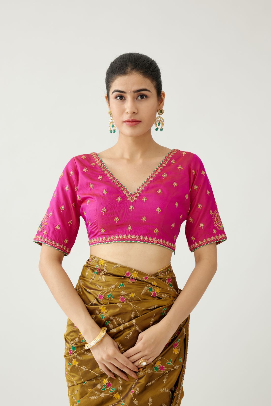 Raspberry silk blouse with princess seams and all-over delicate dori and silk thread embroidered.
