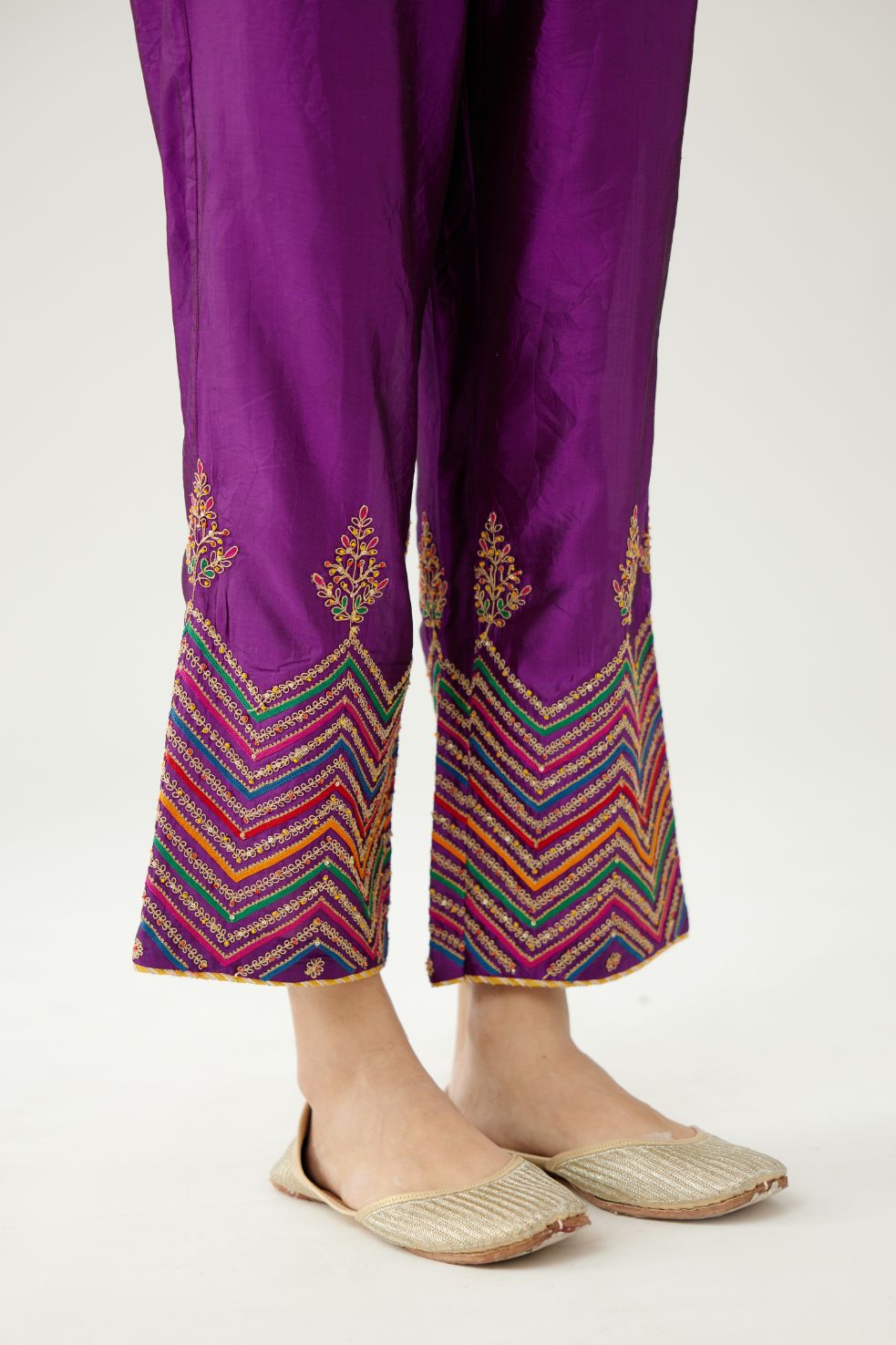 Plum purple silk pants detailed with dori, silk thread, bead & sequins embroidery.
