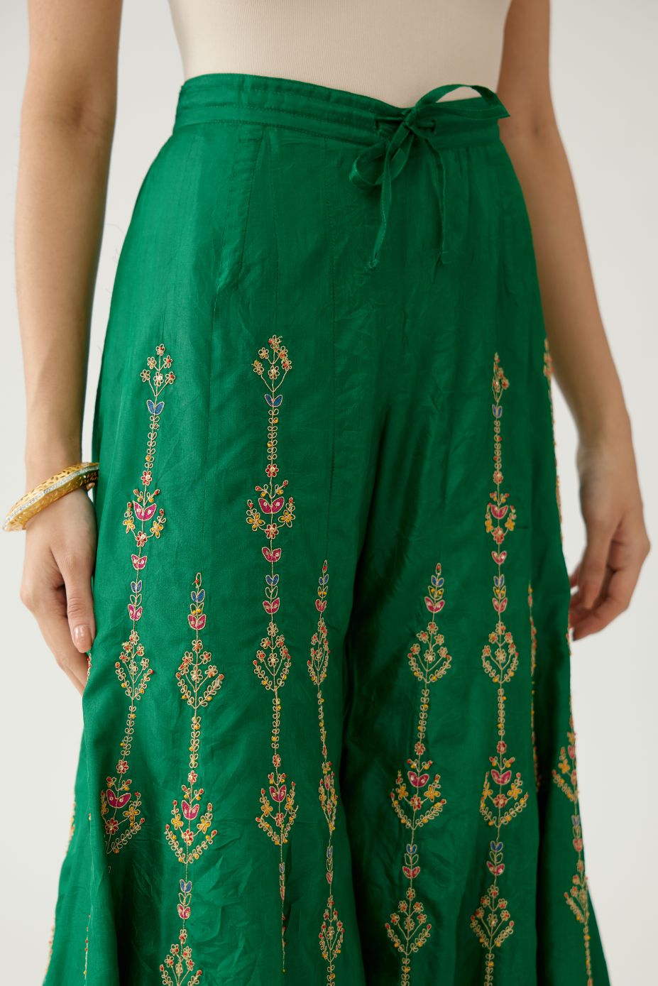 Green silk farshi with all-over dori and silk thread embroider.