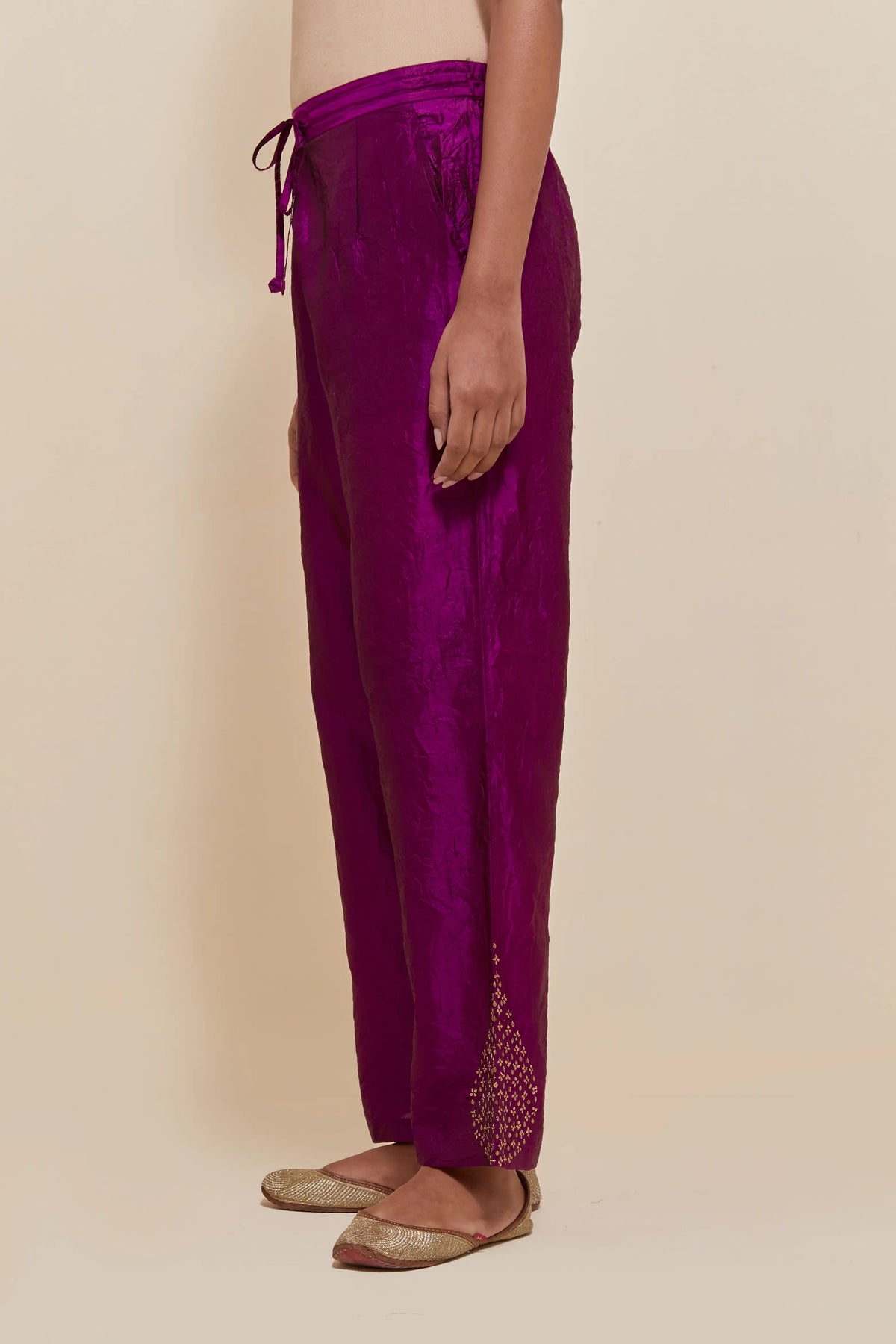 Purple Silk pants with hand embroidered leaf motifs with delicate sequins work at hem.