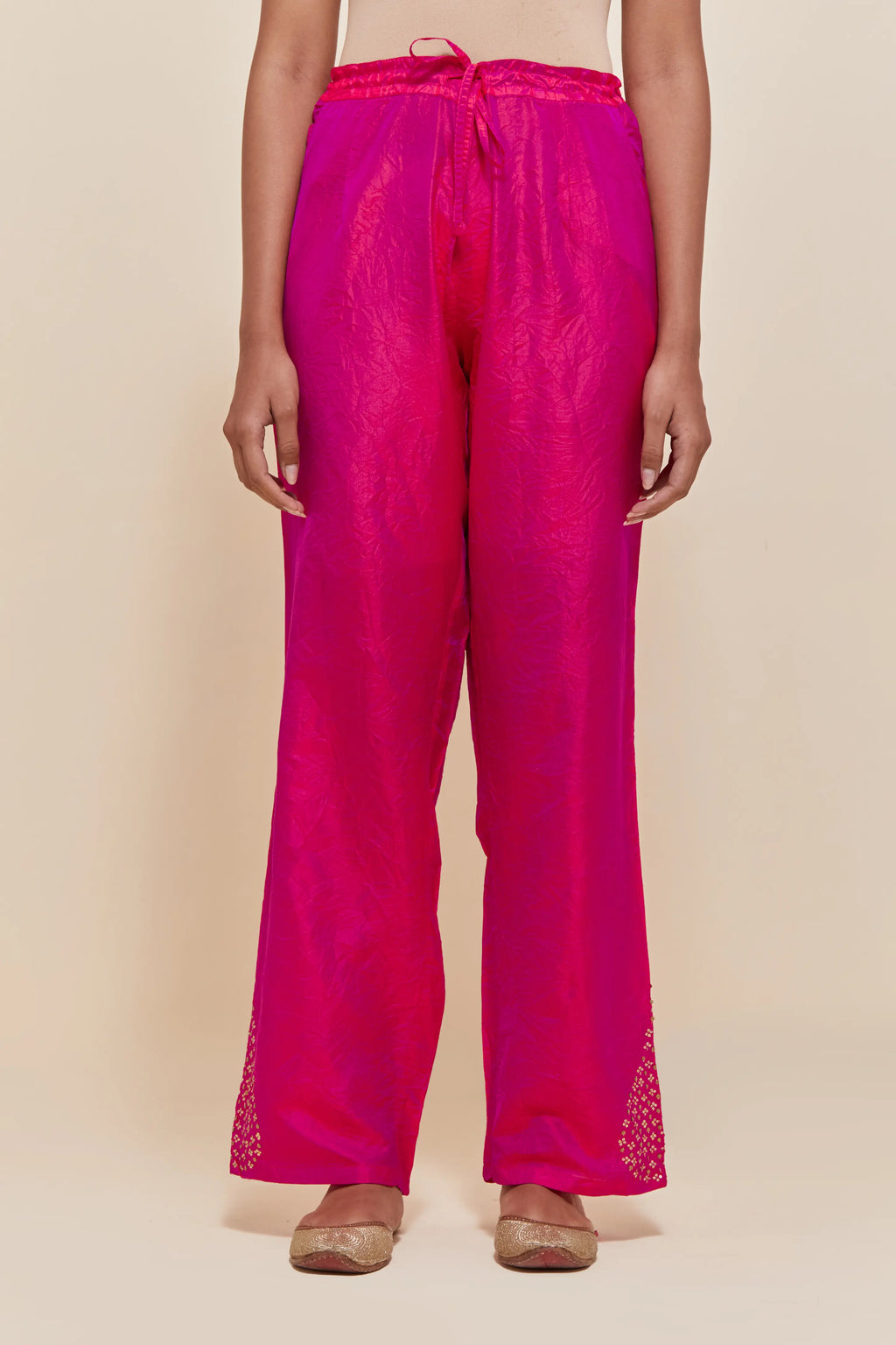 Fuchsia Silk pants with hand embroidered leaf motifs with delicate sequins work at hem.