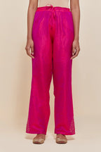 Fuchsia Silk pants with hand embroidered leaf motifs with delicate sequins work at hem.