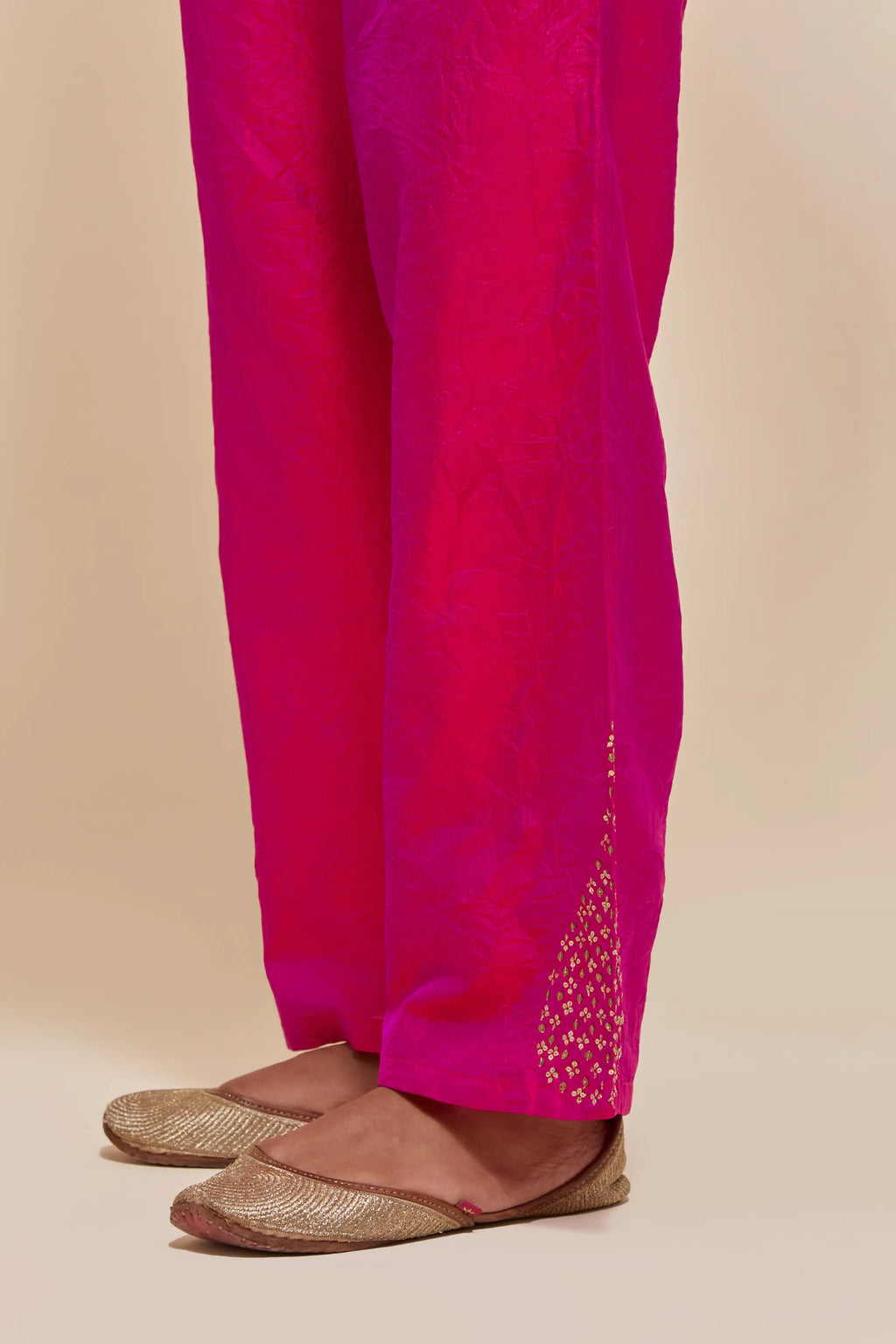 Fuchsia Silk pants with hand embroidered leaf motifs with delicate sequins work at hem.