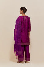 Purple silk dupatta with silk organza at the sides, highlighted with hand-embroidered gold sequins work.