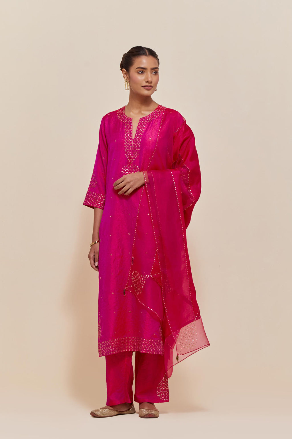 Fuchsia Silk Chanderi straight kurta set featuring all-over hand-embroidered gold sequins.