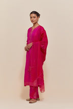 Fuchsia Silk Chanderi straight kurta set featuring all-over hand-embroidered gold sequins.