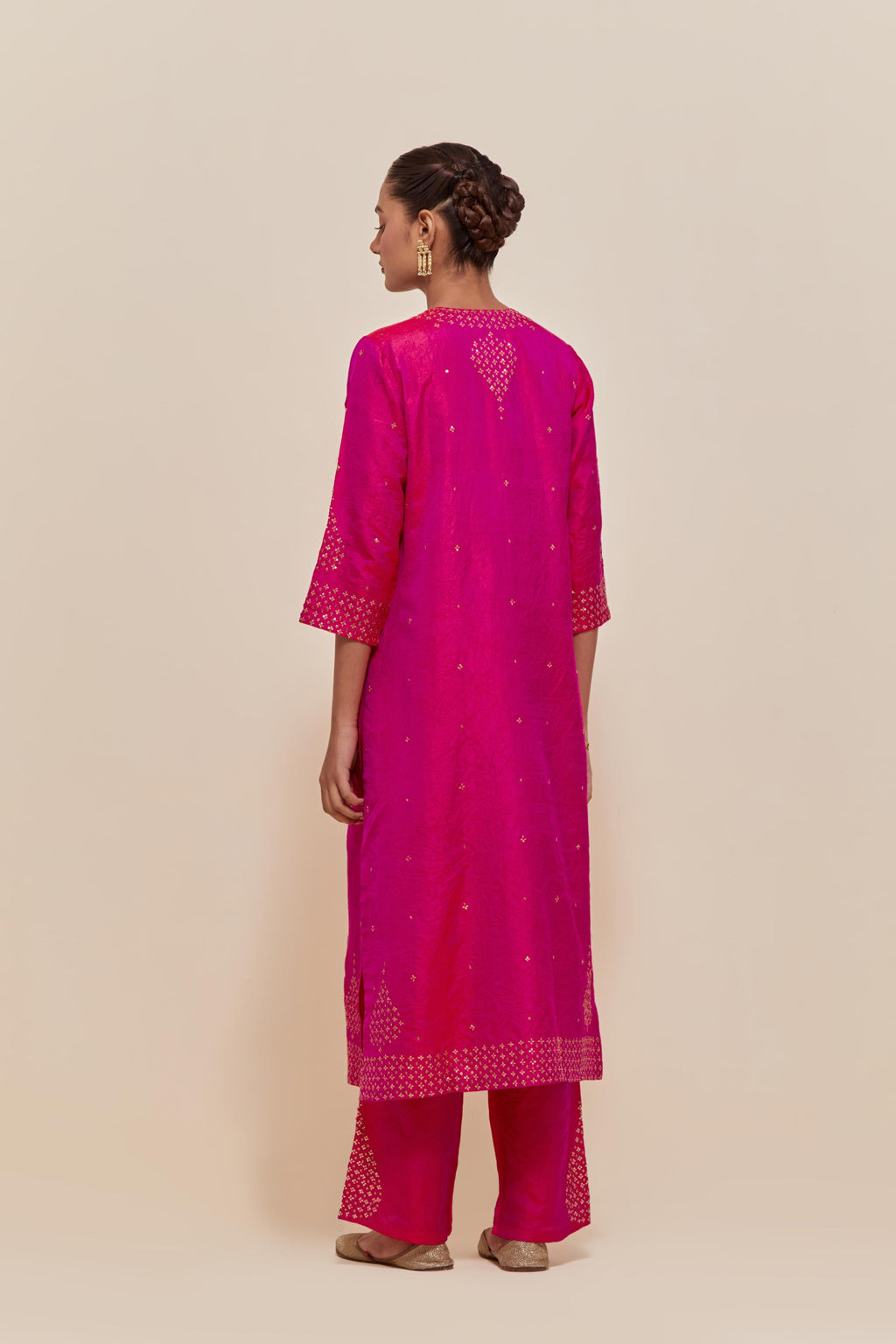 Fuchsia Silk Chanderi straight kurta set featuring all-over hand-embroidered gold sequins.