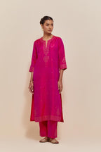 Fuchsia Silk Chanderi straight kurta set featuring all-over hand-embroidered gold sequins.