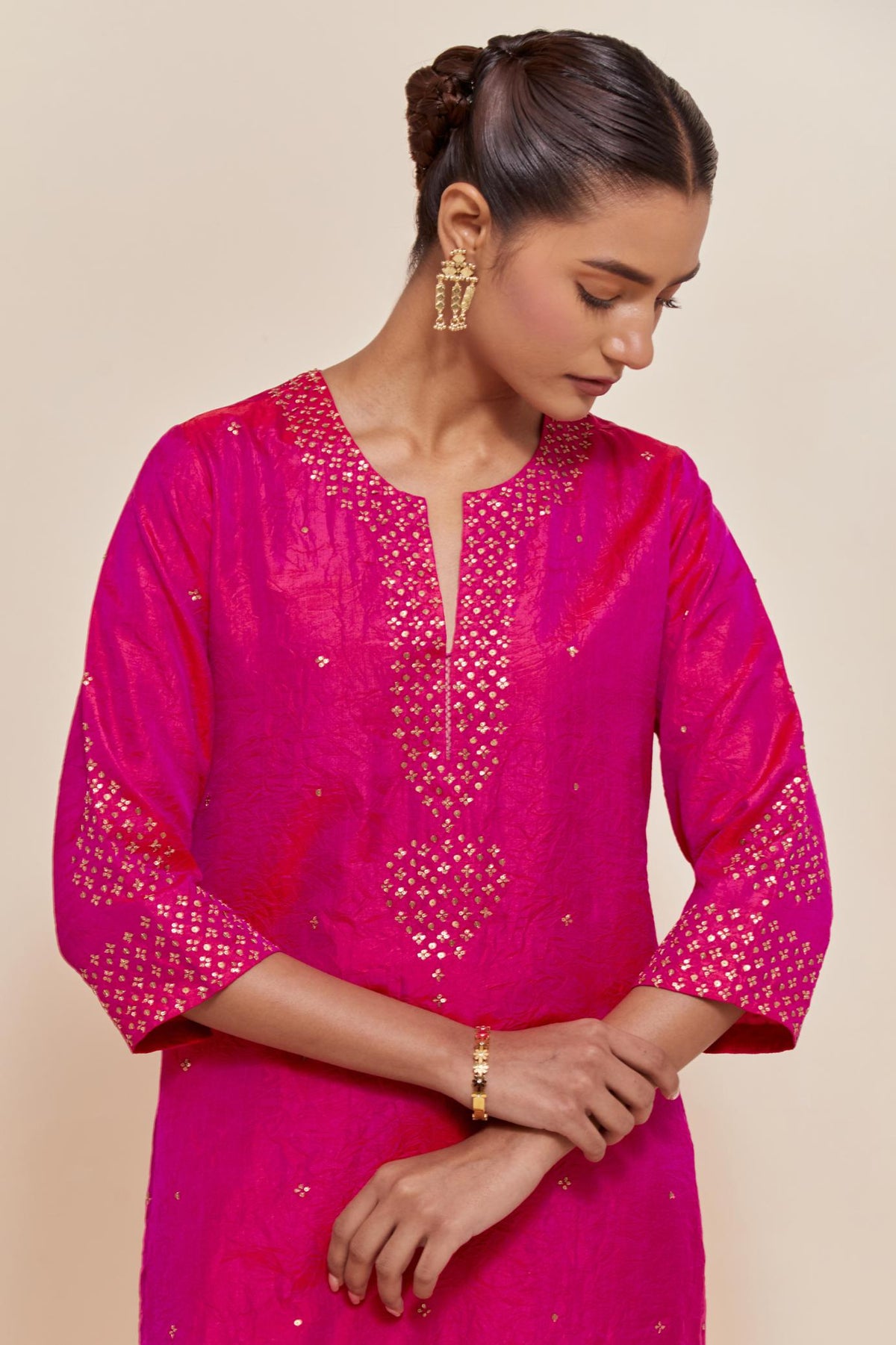 Fuchsia Silk Chanderi straight kurta set featuring all-over hand-embroidered gold sequins.