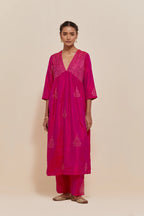 Fuchsia silk kurta set with hand embroidered sequins at yoke and leaf motif all-over the kurta.