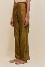 Olive Silk pants with hand embroidered leaf motifs with delicate sequins work at hem.