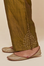 Olive Silk pants with hand embroidered leaf motifs with delicate sequins work at hem.