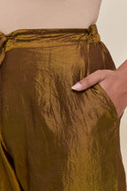 Olive Silk pants with hand embroidered leaf motifs with delicate sequins work at hem.