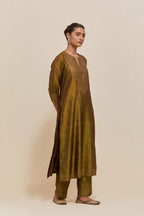 Olive silk straight kurta set with hand-embroidered sequins at the neck, hem and sleeves, highlighted with scattered gold sequins embellishments all-over.