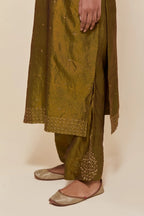 Olive silk straight kurta set with hand-embroidered sequins at the neck, hem and sleeves, highlighted with scattered gold sequins embellishments all-over.