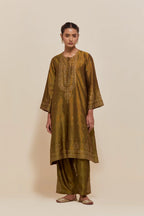 Olive silk A-line short kurta set with hand-embroidered sequins at the neck, borders running along the hem and sleeve edges, and scattered gold sequin embellishments all-over.