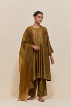 Olive silk A-line short kurta set with hand-embroidered sequins at the neck, borders running along the hem and sleeve edges, and scattered gold sequin embellishments all-over.