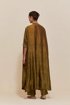 Olive silk long kaftan with hand-embroidered sequins at the neck and diamond motifs along the sides, paired with olive Silk pants with hand embroidered leaf motifs with delicate sequins work at hem.