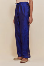 Blue Silk pants with hand embroidered leaf motifs with delicate sequins work at hem.