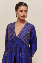 Blue silk kurta set with hand embroidered sequins at yoke and leaf motif all-over the kurta.