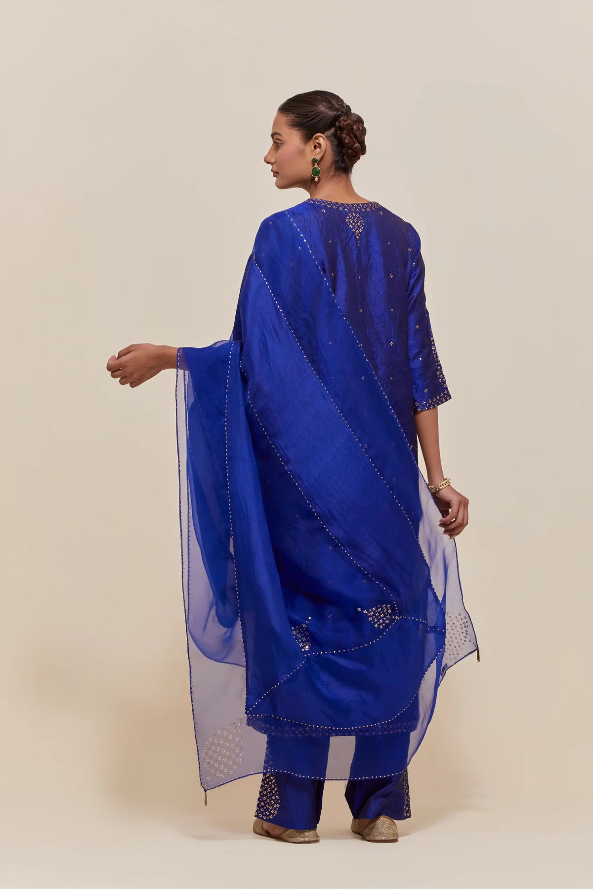 Blue silk kurta set with hand embroidered sequins at yoke and leaf motif all-over the kurta.
