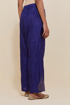 Dark Blue Silk pants with hand embroidered leaf motifs with delicate sequins work at hem.