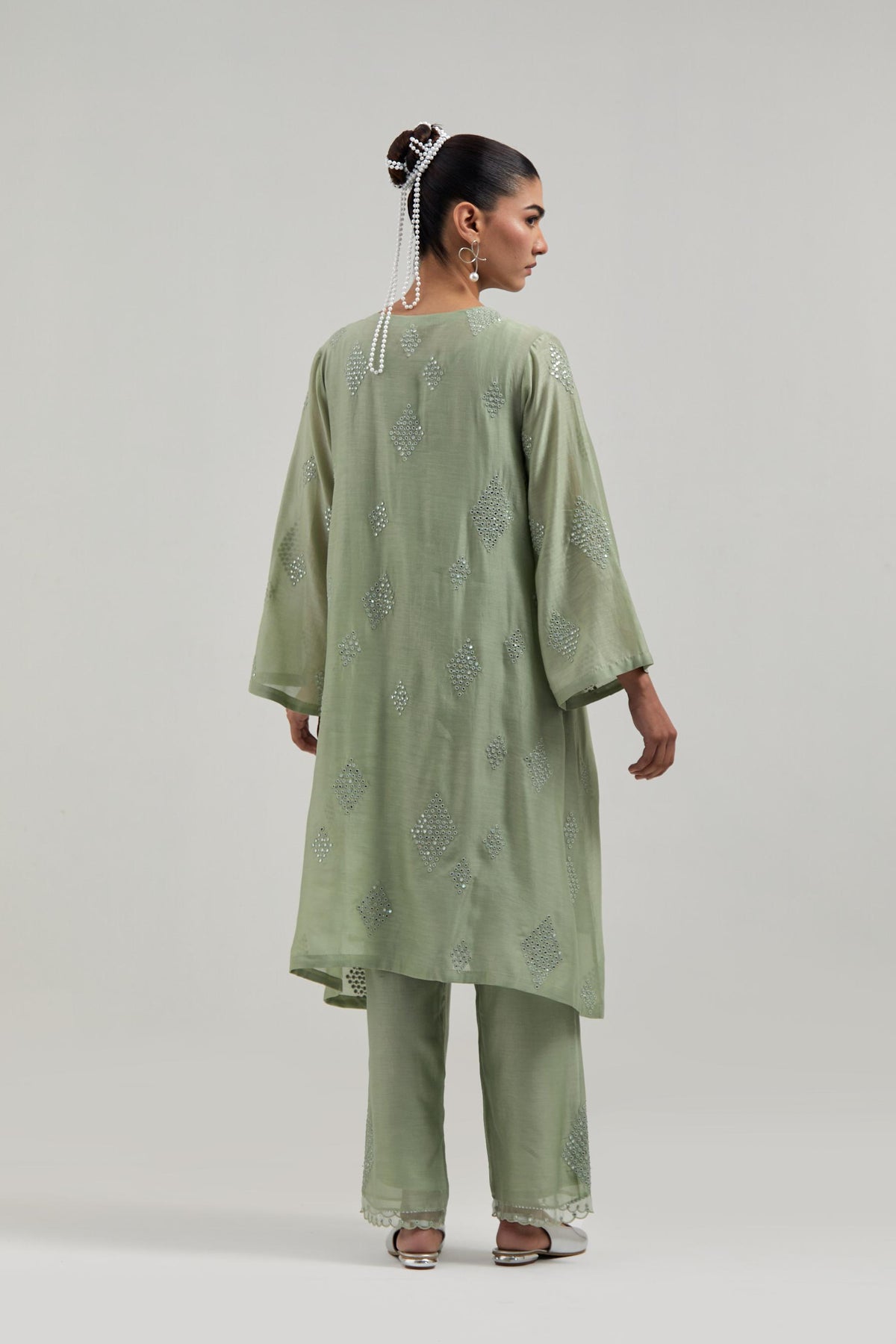 Green Silk Chanderi A-line short kurta set with hand embroidered diamond motifs with delicate mirror and sequins work all-over the kurta.