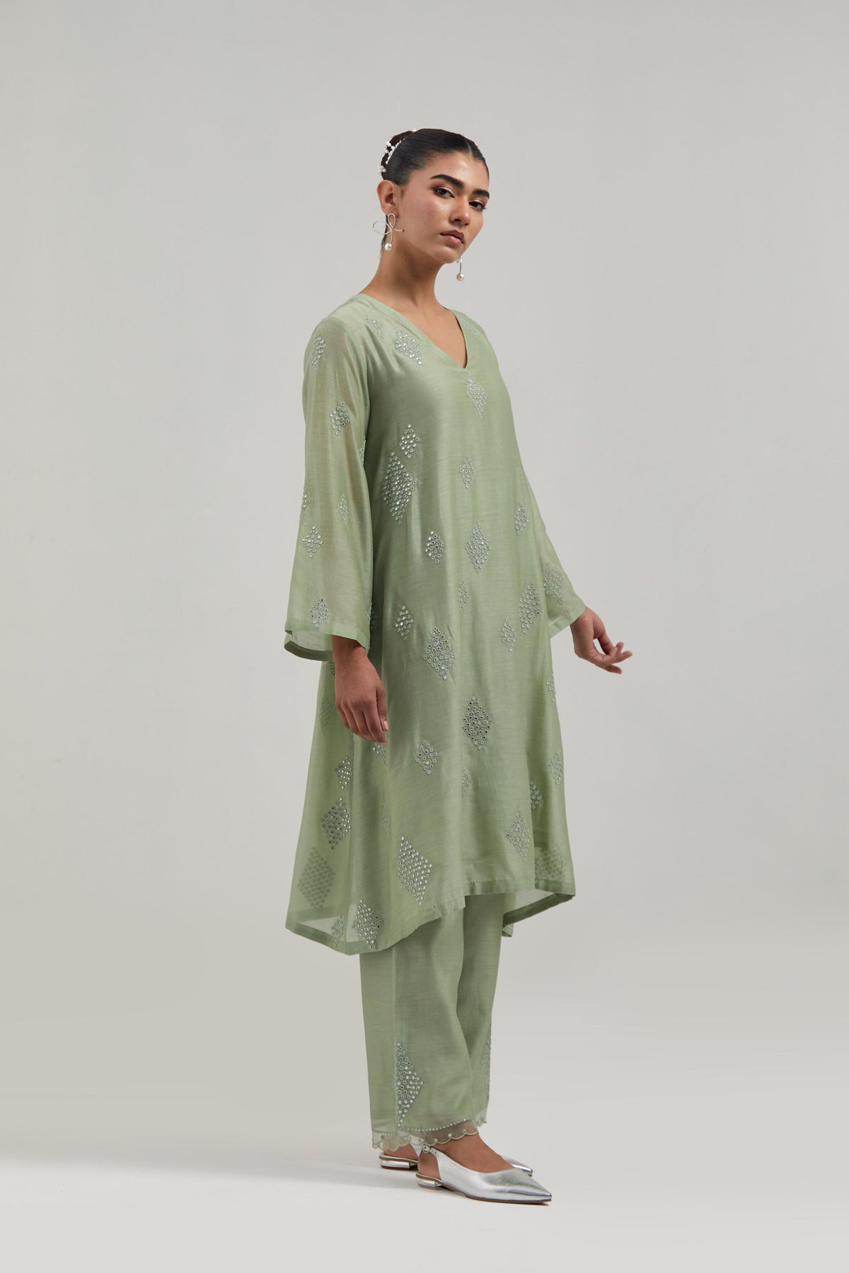 Green Silk Chanderi A-line short kurta set with hand embroidered diamond motifs with delicate mirror and sequins work all-over the kurta.