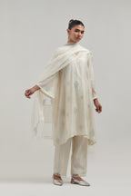 Off white Silk Chanderi A-line short kurta set with hand embroidered diamond motifs with delicate mirror and sequins work all-over the kurta.