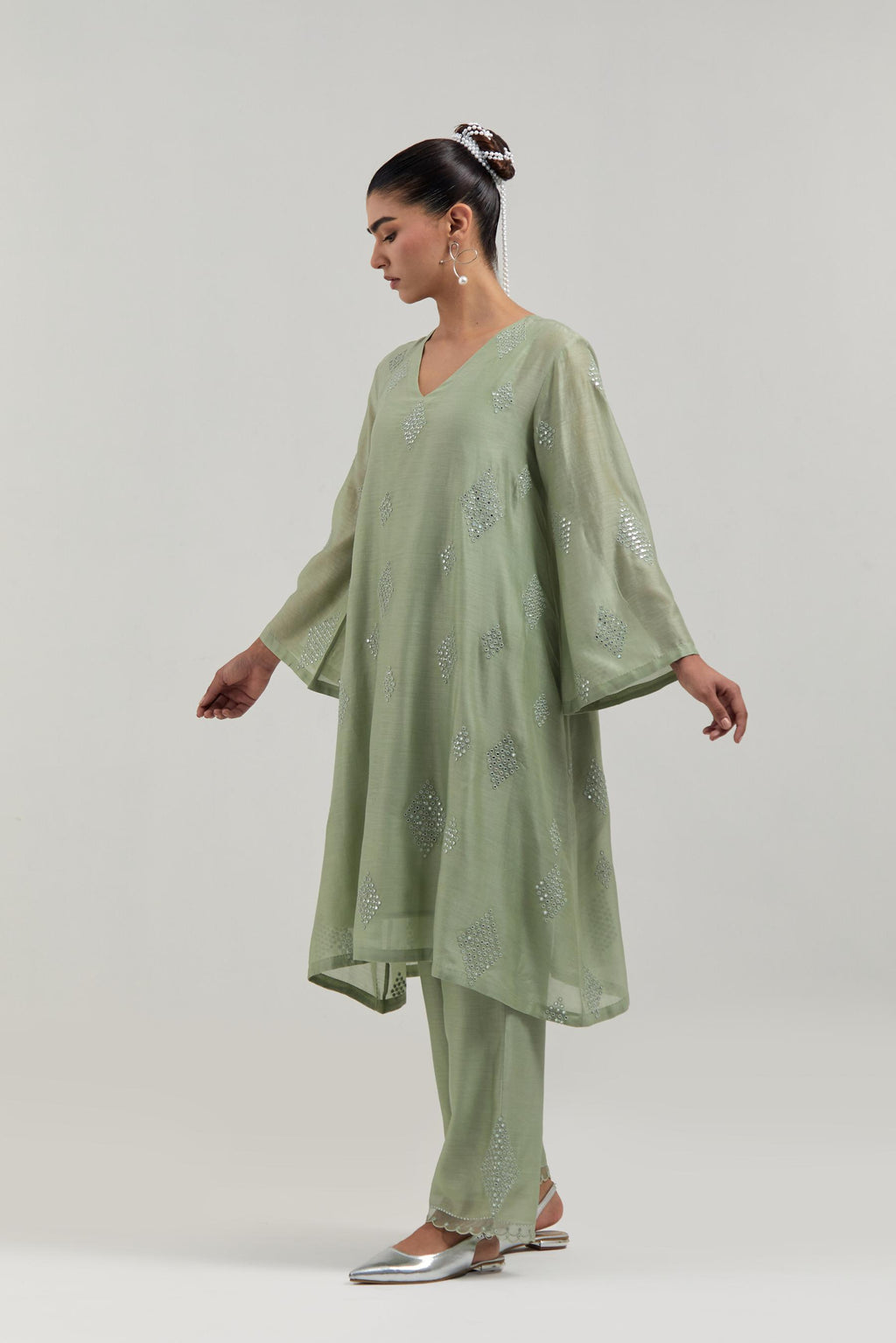 Green Silk Chanderi A-line short kurta set with hand embroidered diamond motifs with delicate mirror and sequins work all-over the kurta.
