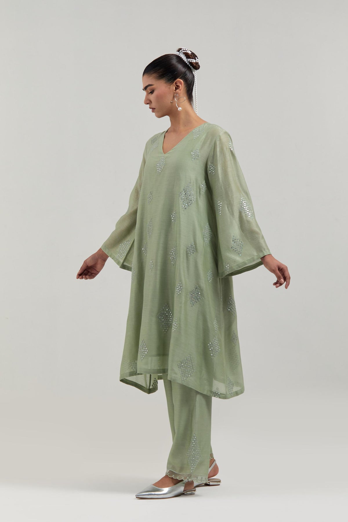 Green Silk Chanderi A-line short kurta set with hand embroidered diamond motifs with delicate mirror and sequins work all-over the kurta.