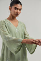 Green Silk Chanderi A-line short kurta set with hand embroidered diamond motifs with delicate mirror and sequins work all-over the kurta.