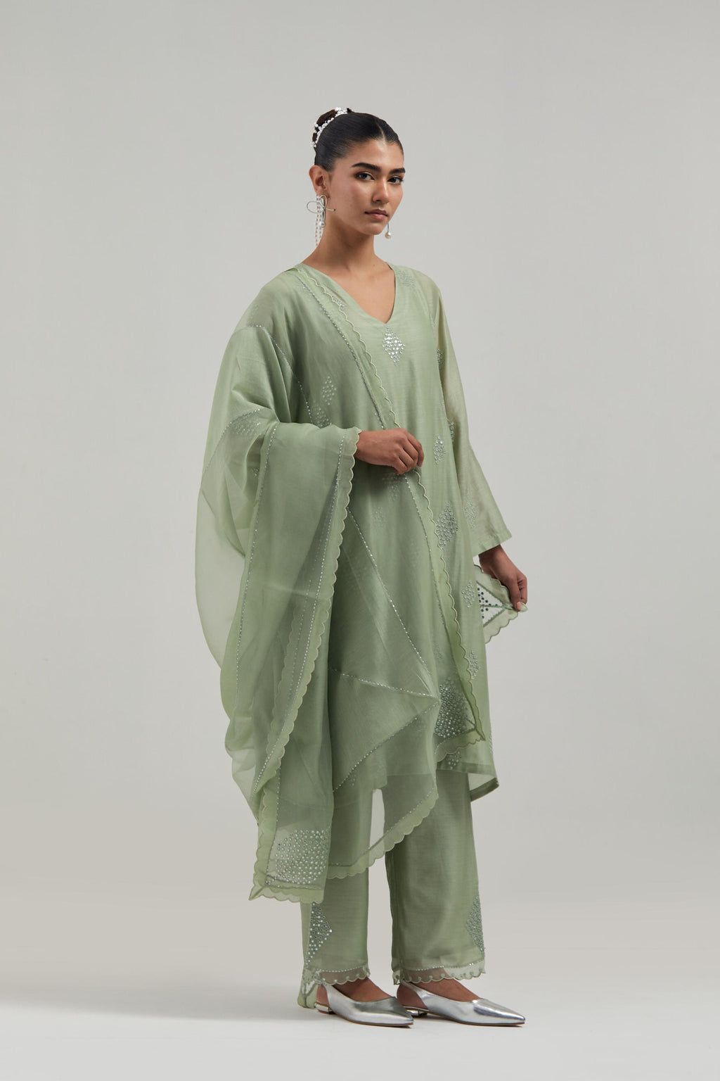 Green Silk Chanderi A-line short kurta set with hand embroidered diamond motifs with delicate mirror and sequins work all-over the kurta.