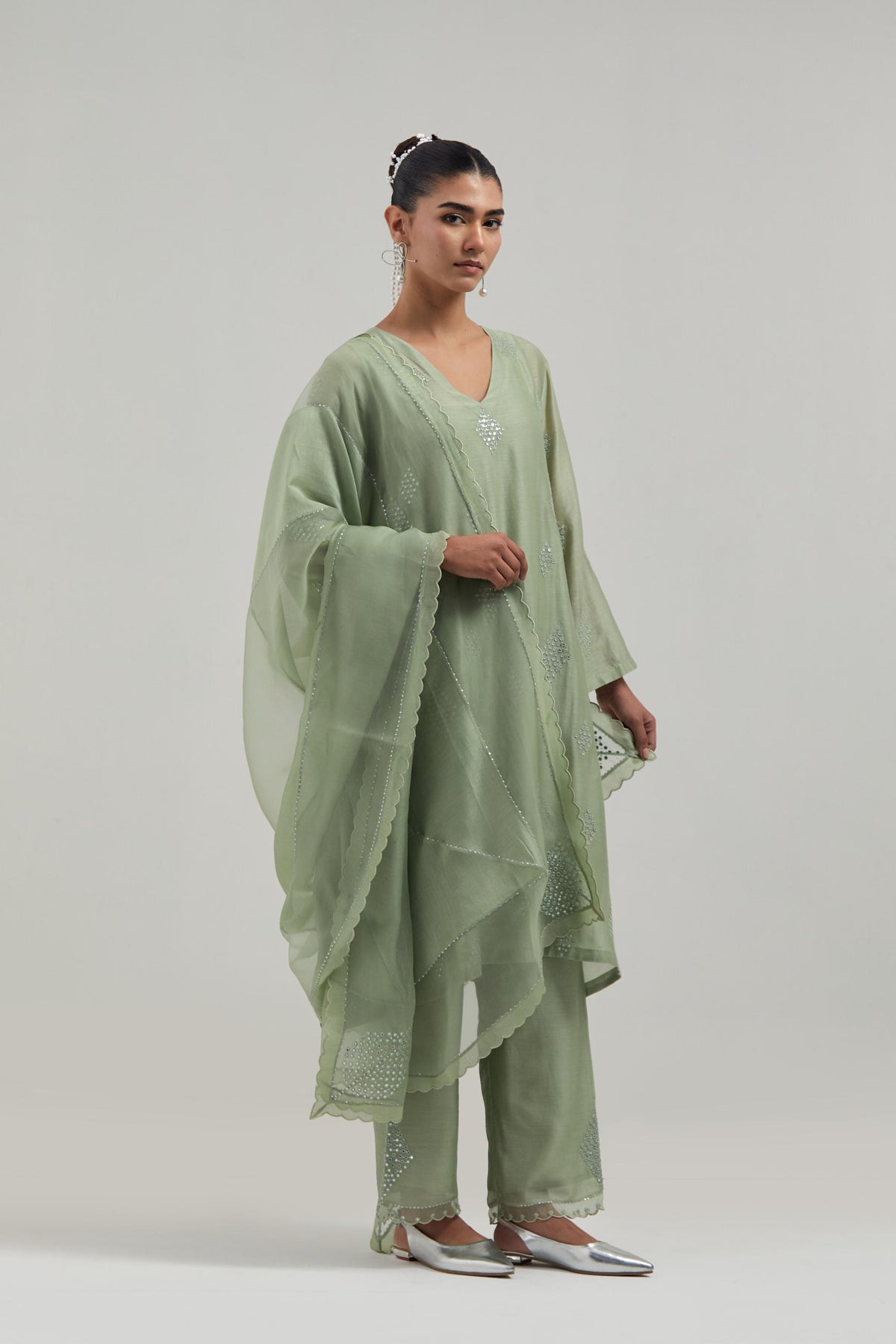 Green Silk Chanderi A-line short kurta set with hand embroidered diamond motifs with delicate mirror and sequins work all-over the kurta.
