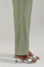Green silk Chanderi straight kurta set with hand-embroidered mirror at the neck, hem and sleeves, highlighted with scattered silver sequin and mirror embellishments all-over.
