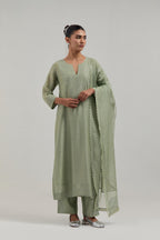 Green silk Chanderi dupatta with silk organza at the sides, finished with delicate scalloped edges, highlighted by hand-embroidered mirror & sequins work.